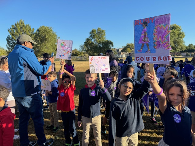 Students with posters getting ready for our Ruby Bridges walk.